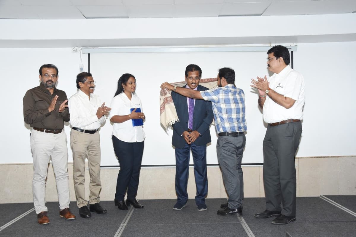 Dr. Sundararaman Chintamani being felicitated with shawl by NIPM Madras Chapter members