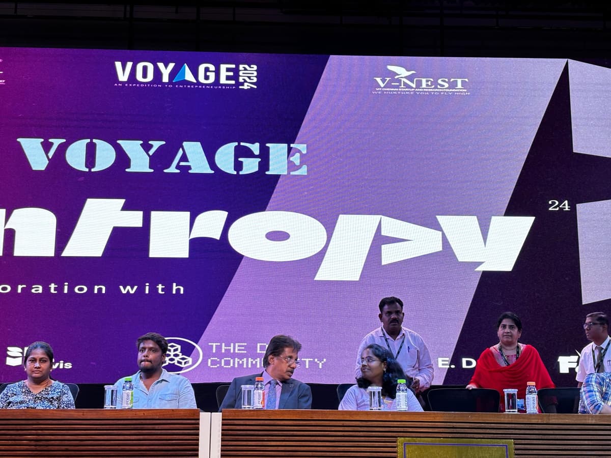 Jury panel seated with Voyage Entropy 24 screen at VIT Chennai