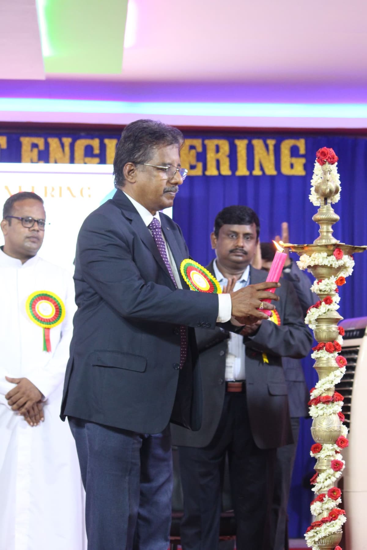 Dr. Sundararaman lighting the auspicious lamp as Chief Guest at Nexus 2K24 St Josephs College
