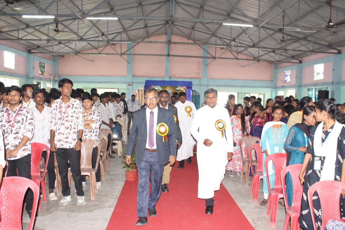 Walking through packed auditorium of 1000 students at Nexus 2K24 symposium