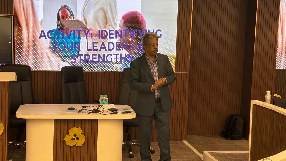 Dr. Sundararaman close-up with Identifying Your Leadership Strengths slide at Indian Bank