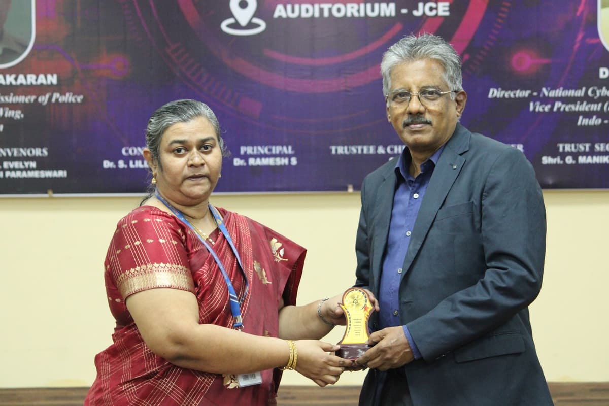 Receiving award at Jerusalem College of Engineering Auditorium