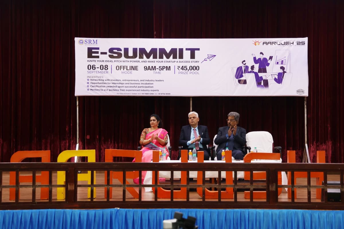On dais with dignitaries at SRM E-Summit Aaruush 25 banner