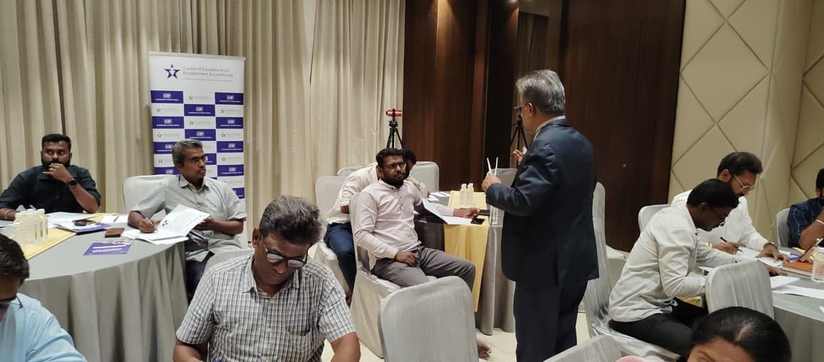 Dr. Sundararaman engaging with entrepreneurs during exercise at CII Erode