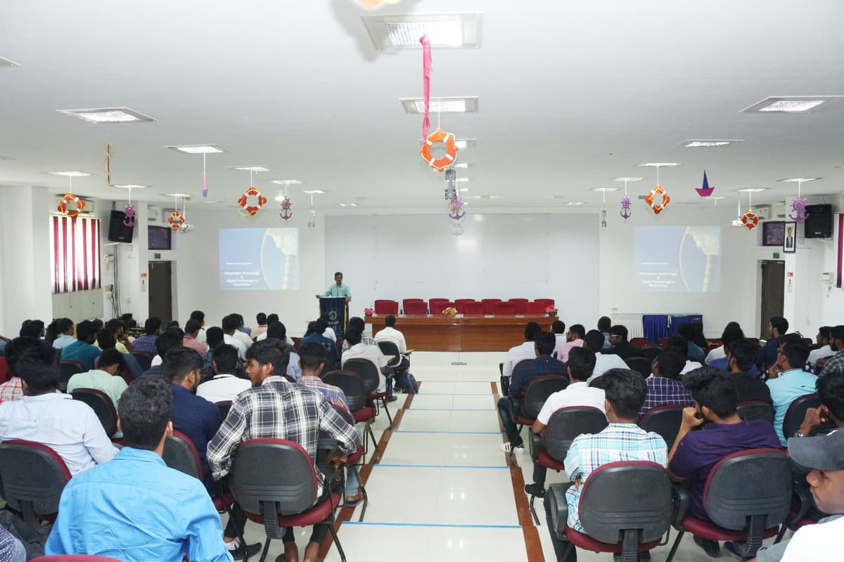 Students attending guest lecture at AMET University auditorium