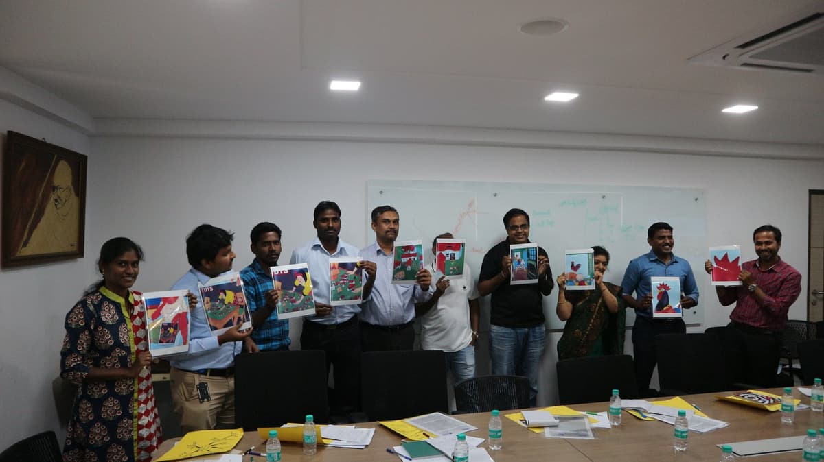 Participants showcasing creative outputs at Design Thinking workshop MMA