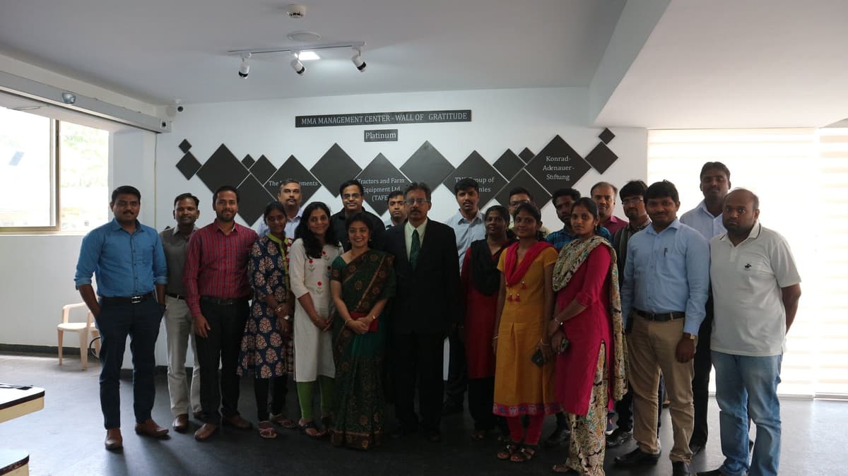 Group photo at MMA Management Center Wall of Gratitude after Design Thinking workshop