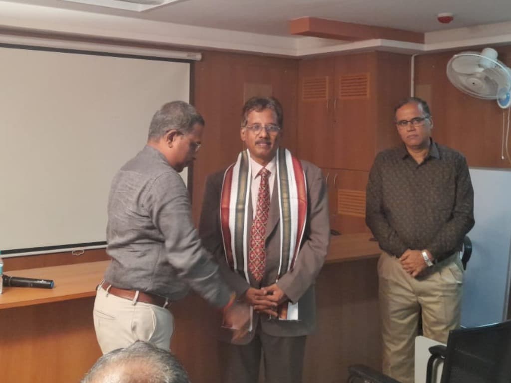 Dr. Sundararaman felicitated with shawl at IIF Chennai Chapter