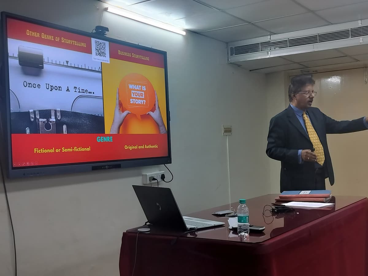 Dr. Sundararaman presenting Mythological Storytellers slide at Indian Bank IMAGE